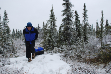 Rosvel pulling water back to the cabin.