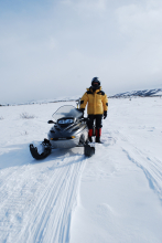 John Wood with the snowmobile