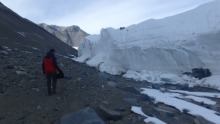 Scott George hikes along the Canada Glacier.