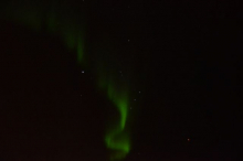 Aurora over Orion's constellation