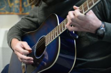 Brian playing guitar