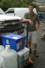 Dan preparing to load supplies that will be shipped by boat.