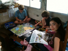 Kids at play on a commercial fishing boat in Alaska