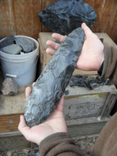 Bill Hedman shows a stone tool