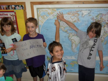 Students point to the dig site