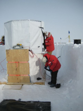 James Roth and Tom Gaisser setup the sunshades.