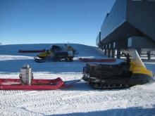 Snowmobiles lie in wait.