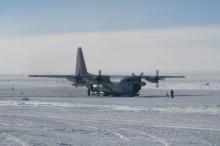 A herc on the runway.