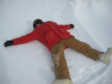 James Roth makes a snow angel