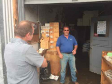 Dr. Adams visiting with an abalone farmer