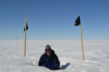 Kevin McMahon peeking out of the snow lab