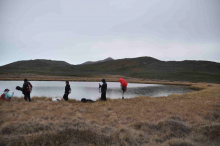 Teams atmosphere and sea tomato collect data at a lake