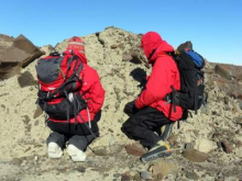 Brenda Hall and Gordon Bromley looking at very old glacial deposits.