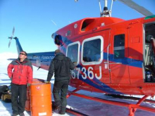 Refueling the helicopter on our way to Mt. Kyffin.