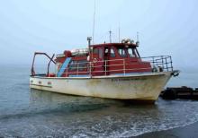 The R/V Annika Marie pulled up on the beach in Browerville (near NAPA).  One of the town boat ramps is just beyond the boat.  The boat ramp is a good way for the fuel truck to get close enough to the boat to fuel her. Photo courtesy Dr. Carin Ashjian.  August 2014.