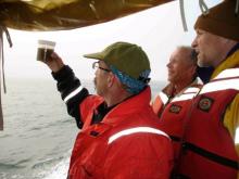 The research team examines a sample.