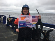 Dr. Ashjian holding an Arctic artwork flag decorated by students at the Anvil City Science Academy in Nome Alaska!  September 2, 2017.  Photo by Lisa Seff.