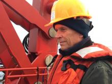 Dr. Steve Okkonen on the deck of the Sikuliaq.  August 2017.  Photo by Lisa Seff.