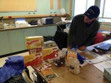 Steve inspects his birthday bonanza on a bad weather day in Barrow.