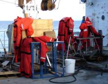 Mustang suits drying on deck after being washed.