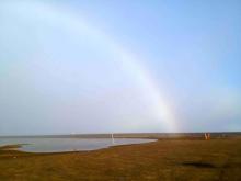 Rainbow over Niksiuraq.August 2014. Photo courtesy of Dr. Carin Ashjian.