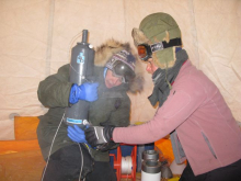 Karie and Tara work with the Niskin bottle.