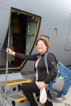 Sheryl Sotelo boarding the C130