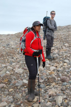 George and Daksha walk on a moraine