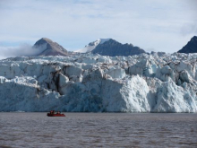 boat in front of glacier