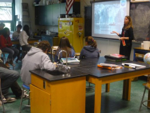 Julie talking to a class