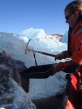 Pulling sediment from an iceberg