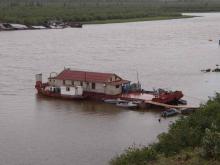 Undergraduate students stay on the Barge on the Panteleikha River.