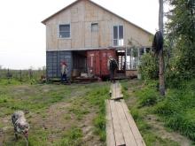 The Pleistocene Part workers house is built on top of two cargo containers.