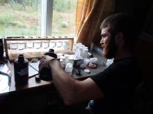 Peter working in the lab to help another student’s experiment.