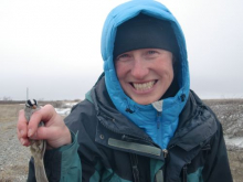 Melissa holding a white crowned sparrow