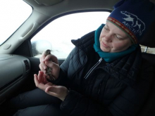 Melissa Lau holding a female longspur