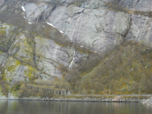 The opening of a 10km road tunnel through the granite mountain.