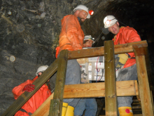 Lifting the Panel up the tunnel stairs.