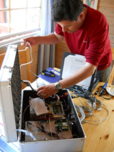 Victor working on electronics