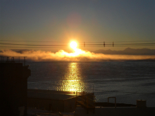 sunset over open water