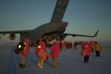 Passengers boarding the C-17