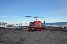 Helicopter landing at Cape Bird