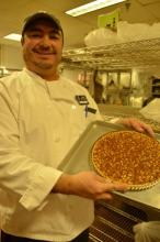 Douglas Sammon shows Michelle Brown the bakery