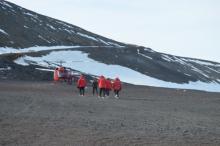 Team Walking to Helicopter