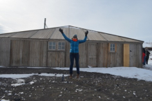 Michelle Brown in front of Discovery Hut