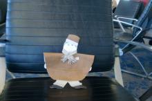 Flat Stanley waiting to board our flight in Charlotte