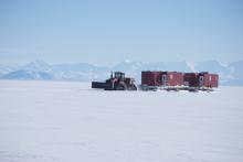 Traverse housing Units being pulled on tractor