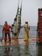 Jamee Johnson and John Betz pull in a trawl on the LMG