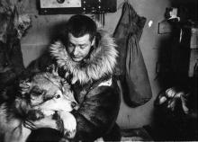 Freddie Crockett with sled dog, Belle