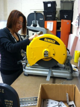 Liliana Diaz operates a circular saw